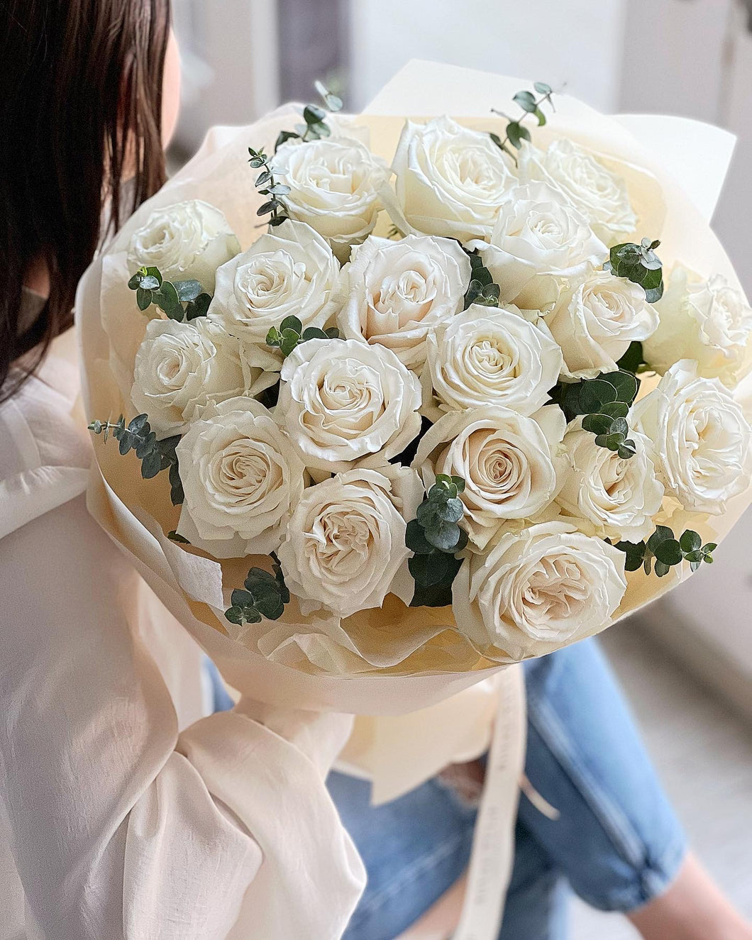 White roses with eucalyptus